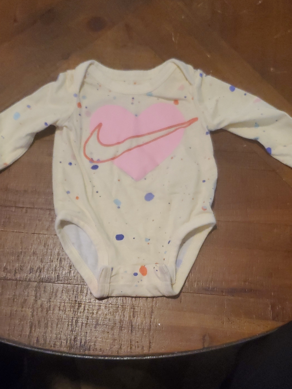 Nike Cream Long-Sleeve Baby Bodysuit with Pink Heart and Multicolor Splatter